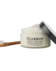 Olverum Body Polish (200 ml) with lid off to the side and wooden spoon with body polish