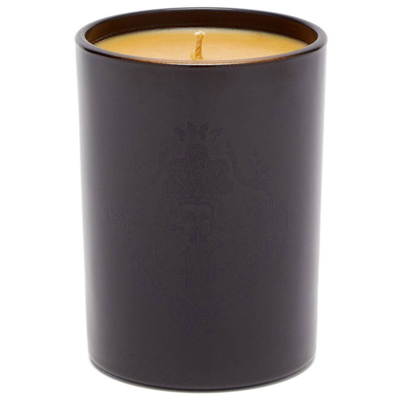Harris Reed Palo Santo Epilogue Candle showing close-up of candle to view engraved crest on jar