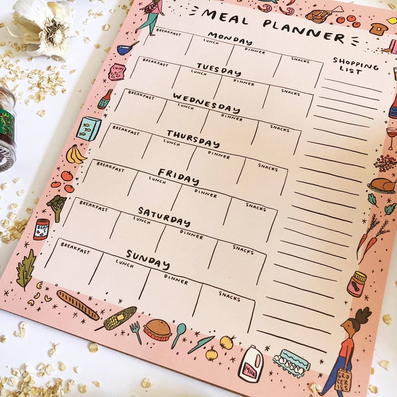 Abbie Ren Illustration Meal Planner Notepad shown at an angle