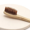 OJOOK Intention Setting Toothbrush showing close-up of brush head