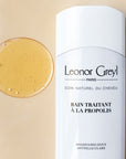 Leonor Greyl Bain Traitant A La Propolis – Gentle Dandruff Treatment Shampoo Product with a product drop
