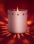 Parfums de Nicolai Secret de Marrakech Candle beauty shot showing light around candle