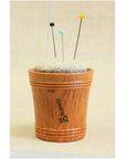 Sajou Wooden Pin Cushion – Natural Linen shown with pins stuck in it (not included)