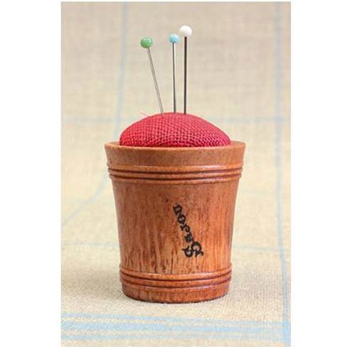 Sajou Wooden Pin Cushion – Red Linen shown with pins sticking in it (not included)