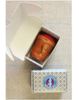 Sajou Wooden Pin Cushion – Red Linen shown in box and a closed box beside it