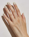Hand of model wearing JINsoon x Suzie Kondi Nail Lacquer – Piedra