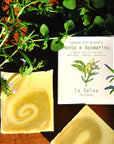 La Selva Positano Cosmetici Naturali Rosemary Mint Solid Soap displayed out of the box surrounded by greenery