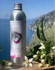 La Selva Positano Cosmetici Naturali Orange Blossom Aromatherapy Cleanser in front of a scenic background