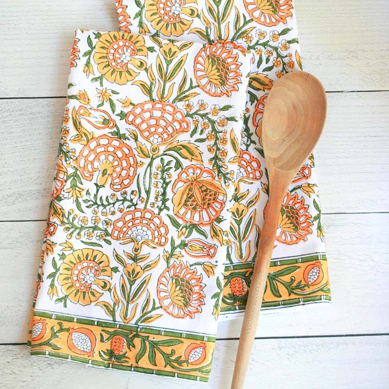 Pacific &amp; Rose Textiles Kitchen Towels – Caroline Marigold displayed next to a wooden spoon