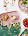 Blu Kat Pink Leopard Round Serving Tray - lifestyle shot showing this tray and another tray (not included) on it.
