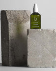 Beauty shot of Bamford Deodorant on large stones