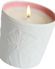 LE JARDIN RETROUVE Rose Trocadero Scented Candle shown with wick lit