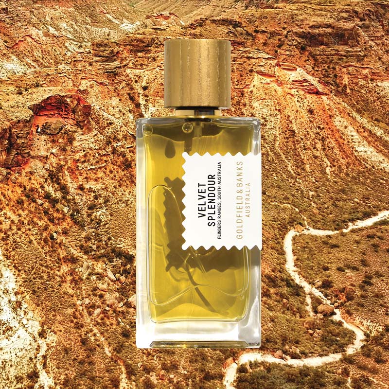 Mood shot of Goldfield &amp; Banks Velvet Splendour Perfume 100 ml with desert mountain in the background
