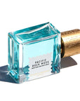 Goldfield & Banks Pacific Rock Moss Perfume showing with a shadow 50 ml shown on its side