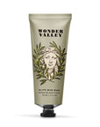 Wonder Valley Olive Mud Mask showing product with olive branches on photo