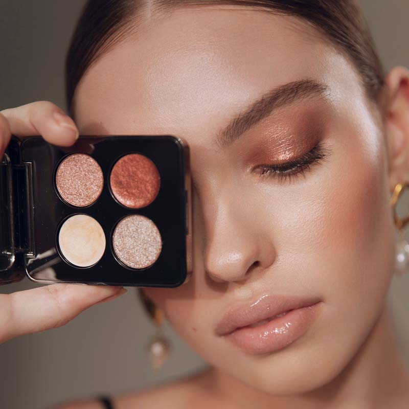 Roen Beauty Mood 4 Ever Eye Shadow Palette showing palette in front of models face