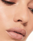 Roen Beauty Kiss My Liquid Lip Balm Shimmer – Rumor showing on model 