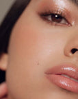 Roen Beauty Kiss My Liquid Lip Balm Shimmer – Rumor showing on model