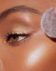 Roen Beauty Roglow Skin Stick Highlighter – Lit showing on cheek