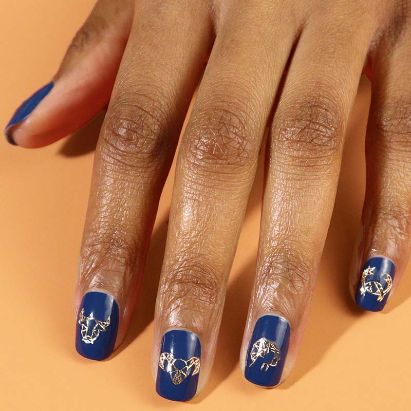 JINsoon Star Signs Nail Art Applique showing art on blue nails