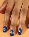 JINsoon Star Signs Nail Art Applique showing art on blue nails