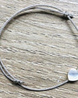 YSIE Silver Camille Bracelet – Heart - Product displayed on table