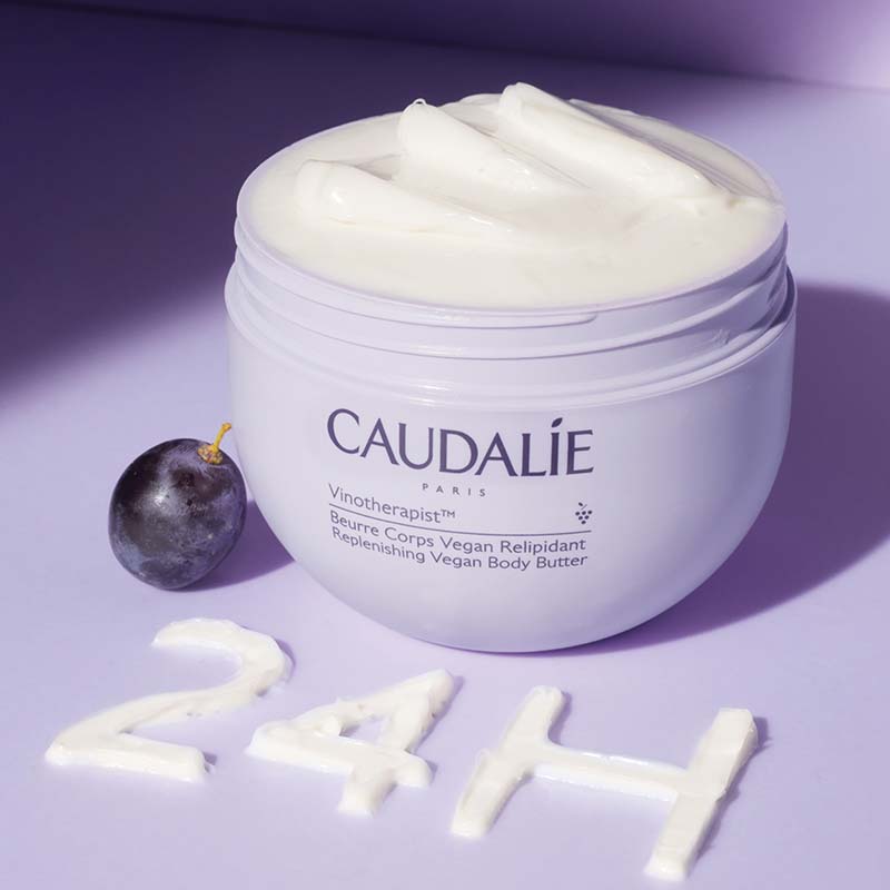 Caudalie Vinotherapist Replenishing Vegan Body Butter showing product spelling out 24 hr