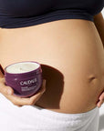 Caudalie Vinosculpt Lift & Firm Body Cream showing next to pregnant belly