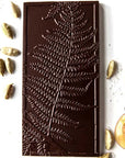 Wildwood Chocolate Cardamom and Honey Caramel with Sea Salt showing ingredients surrounding chocolate bar