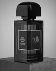 BDK Parfums Gris Charnel Extrait showing bottle sitting on stone