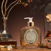 Santa Maria Novella Tabacco Toscano Liquid Soap showing on a counter with smoke in the background