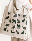 Sava Seasons Foldable Linen Shopper Tote – Natural Cats showing tote hanging from shoulder