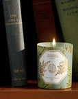 Carriere Freres Absinthe Candle showing on a book shelf surrounded by green books