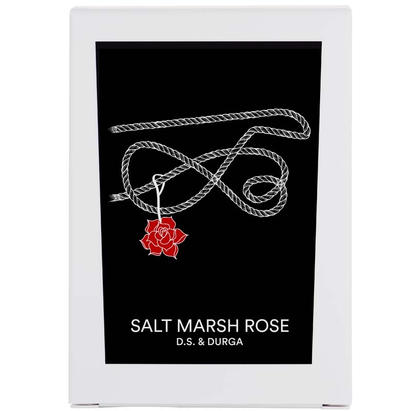 D.S. &amp; Durga Salt Marsh Rose Candle showing white box with black label with a red rose hanging from a rope