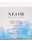 NEOM Organics Real Luxury Body Scrub showing blue packaging