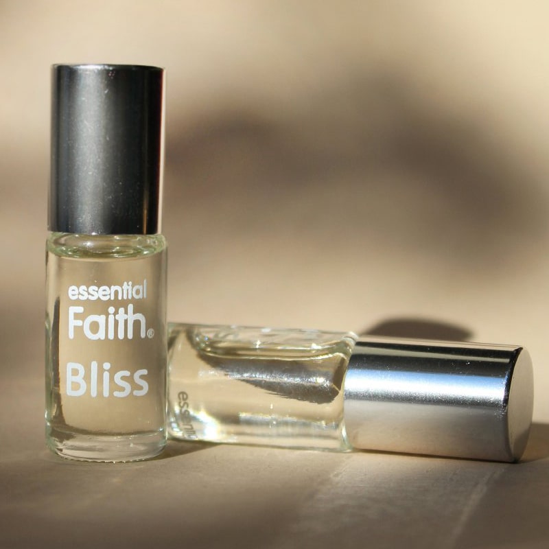 Essential Faith Bliss Roll-On showing bottles one laying on its side and one standing