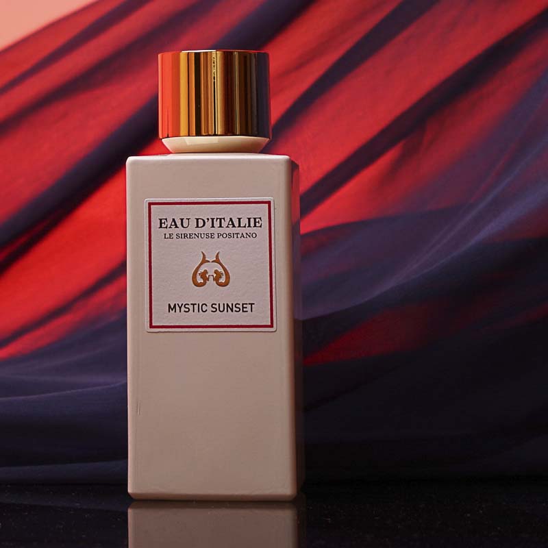 Eau d&#39;Italie Mystic Sunset Eua de Parfum Spray showing with a red backdrop