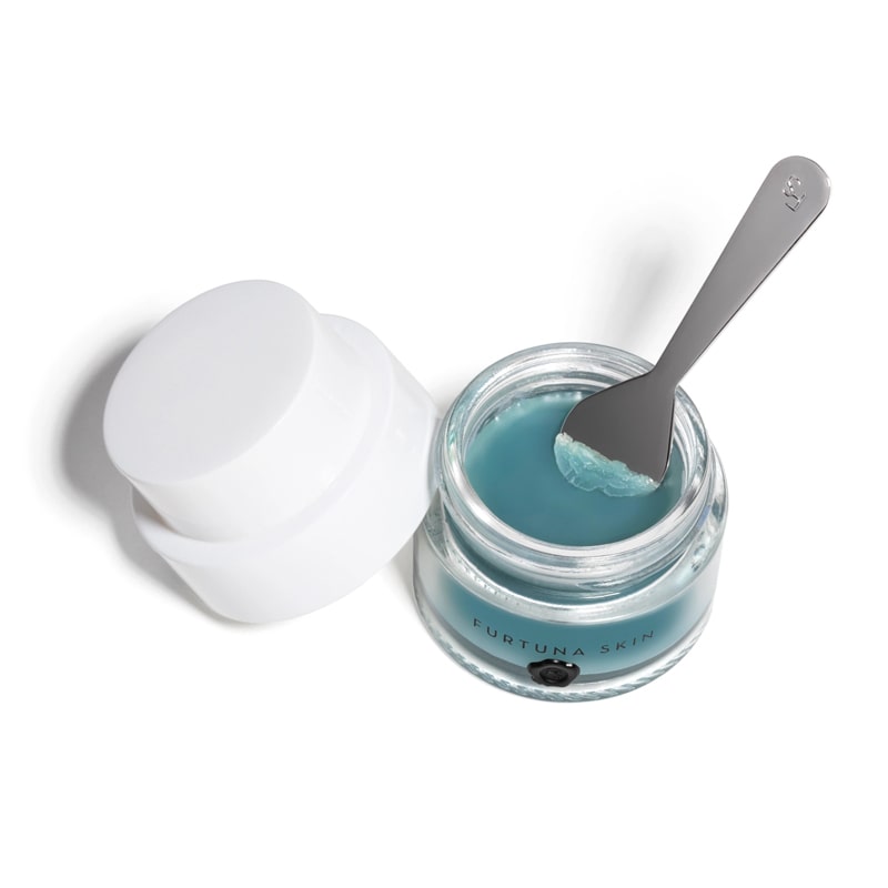Furtuna Skin Rinascita Delle Olive Replenishing Recovery Balm showing balm being scooped