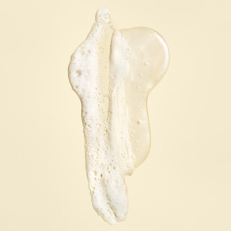 Oribe Gold Lust Repair & Restore Shampoo showing smear