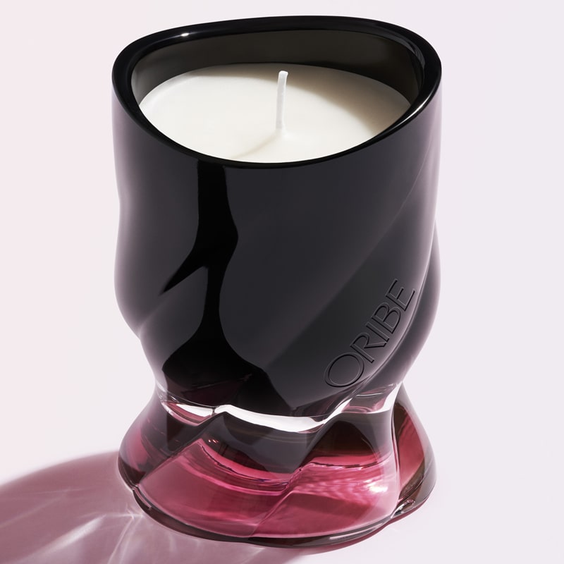 Oribe Valley of Flowers Candle showing purple glass