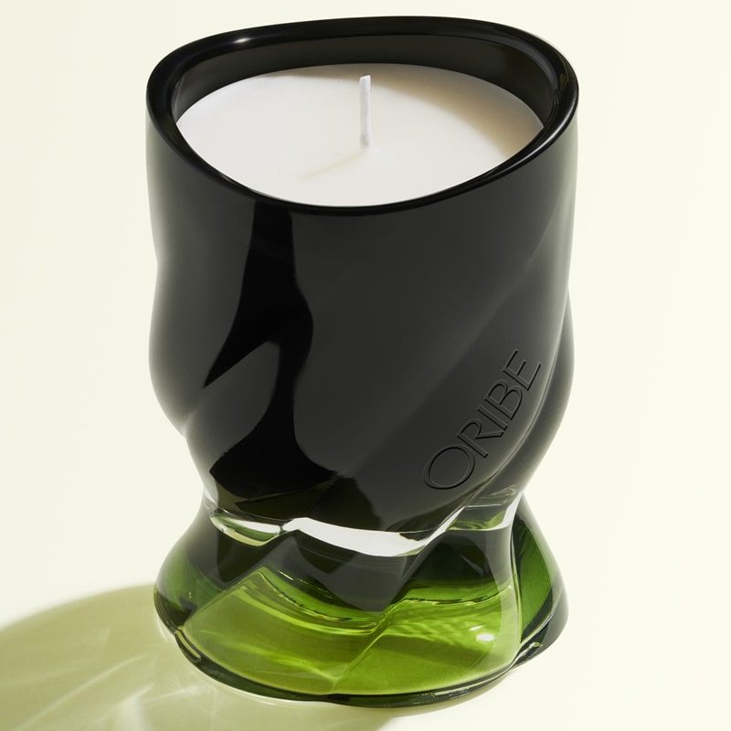 Oribe Desertland Candle showing candle with green glass