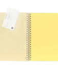 Delfonics Rollbahn Clear Large Spiral Notebook – Clear Pink showing inside yellow pages