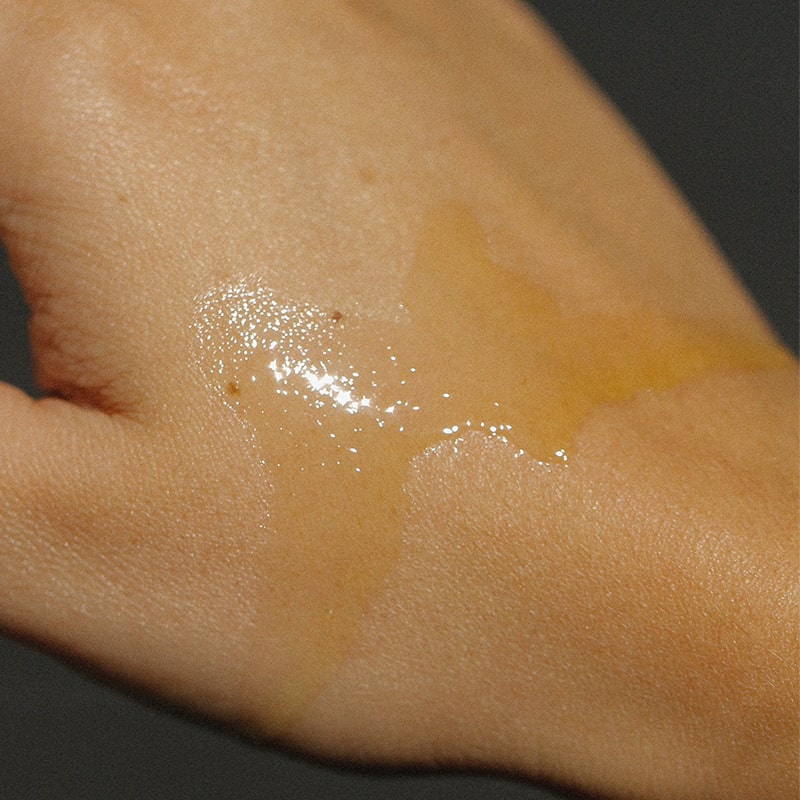 Bathing Culture Heat Wave Body Oil - Nude Beach showing smear on top of hand