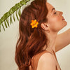 Rahua by Amazon Beauty Enchanted Island Salt Spray Travel Size showing beachy waves on red hair