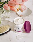 Christophe Robin Color Shield Cleansing Mask With Camu Camu Berries showing on counter with lid off with smear next to it