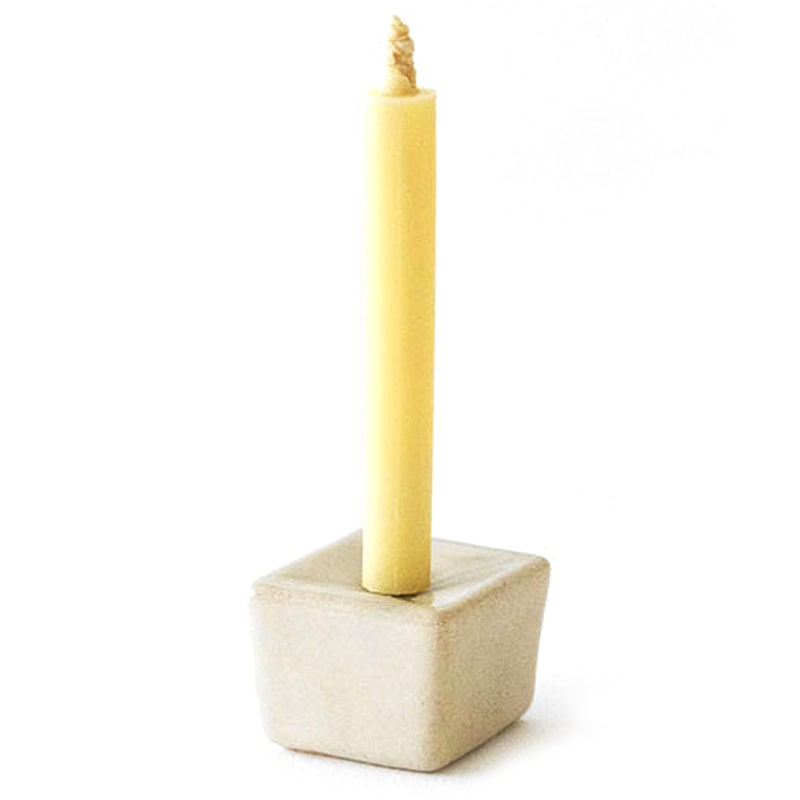DAIYO Ceramic Cubic Candle Stand – Beige showing with yellow candle stick 