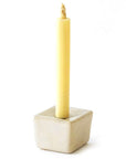 DAIYO Ceramic Cubic Candle Stand – Beige showing with yellow candle stick 