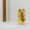 Susanne Kaufmann Bath for the Senses beauty shot showing bottle on edge of tub