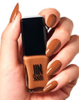 JINsoon Nail Lacquer – Earth Clay - Prodcut shown in models hand