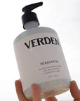Verden Herbanum Hand And Body Wash - Product shown in models hand